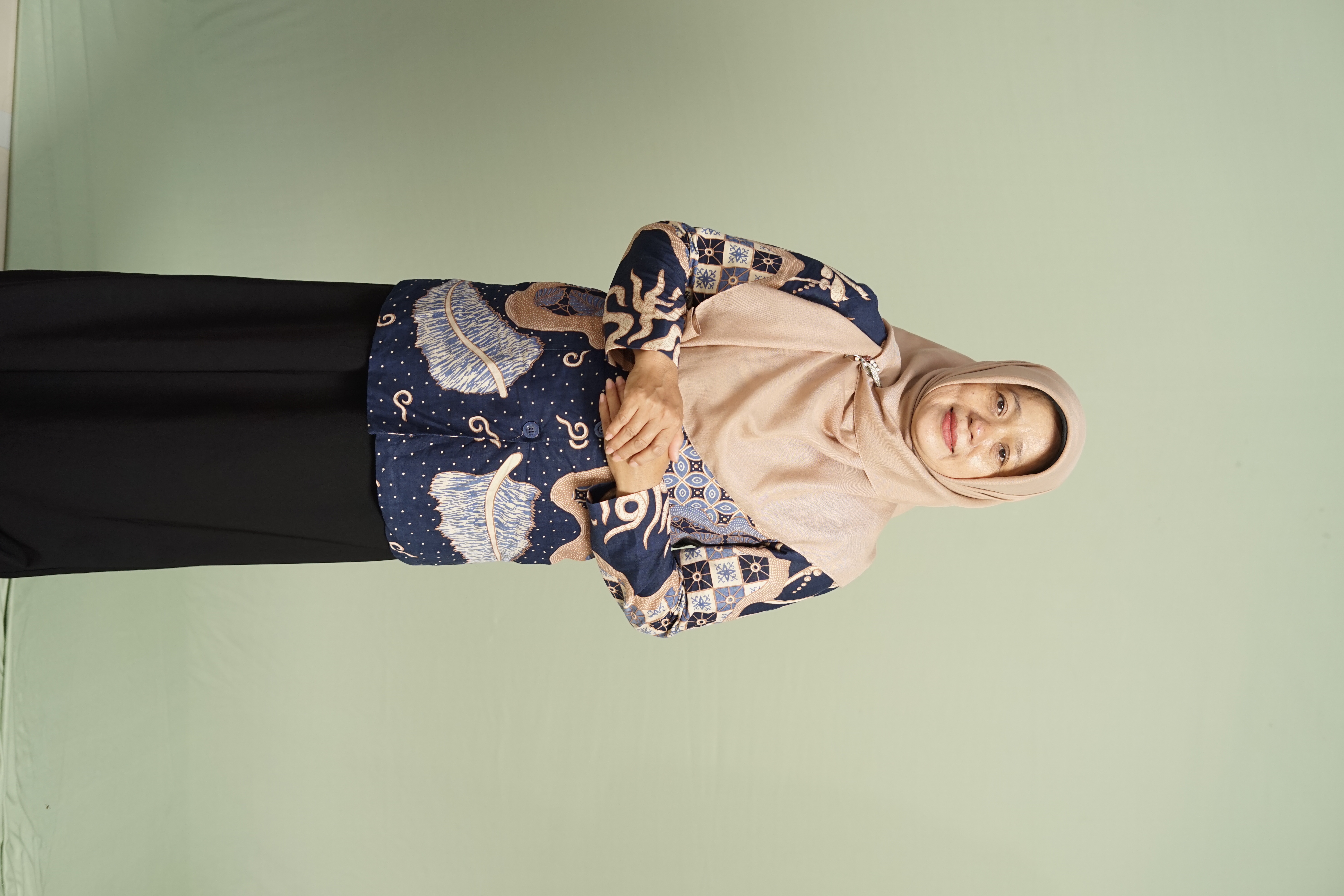 <center>WALI KELAS<br>SRI HARTINI,S.E.</center>